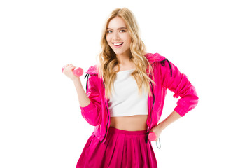 Young girl wearing pink working out with dumbbells isolated on white