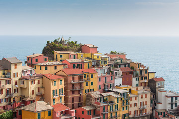 Fototapeta na wymiar Manarola town, one of five famous colorful villages of Cinque Terre in Italy.