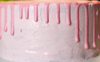 Making of tasty pink homemade cake.
