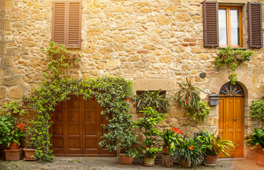 Fototapeta na wymiar Colorful old street in Pienza, Tuscany, Italy