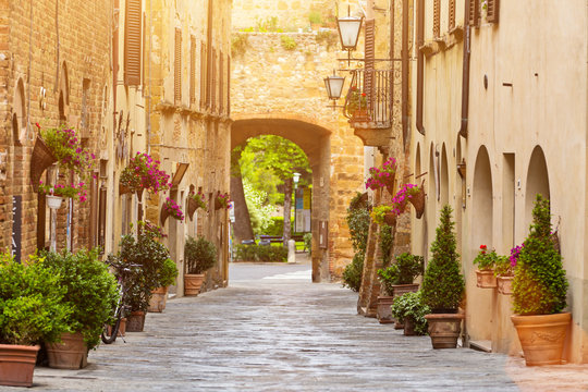 Fototapeta Colorful old street in Pienza, Tuscany, Italy