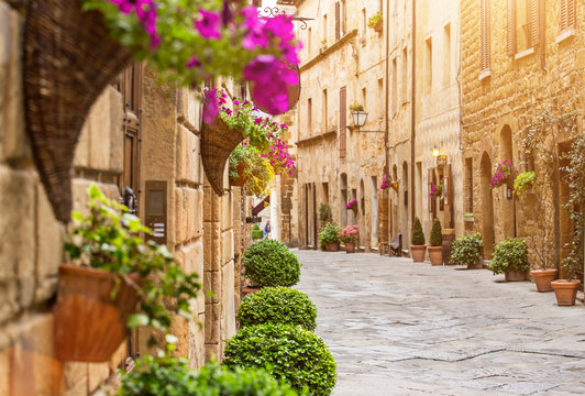 Fototapeta Colorful old street in Pienza, Tuscany, Italy
