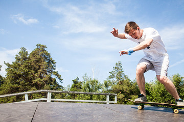 teenagerr riding  on skateboard