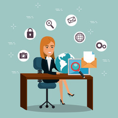 businesswoman in the office with e-mail marketing icons