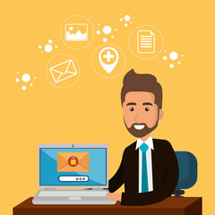 businessman in the office with e-mail marketing icons