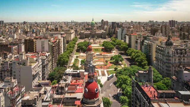Buenos Aires, Argentina, time lapse view of cityscape including National Congress building and Plaza del Congreso square at sunset. 