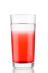 Glass with cranberry juice on white background