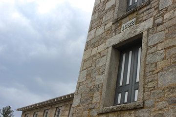 Old stone clock tower historic mill building