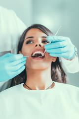 Pretty young woman at dentist