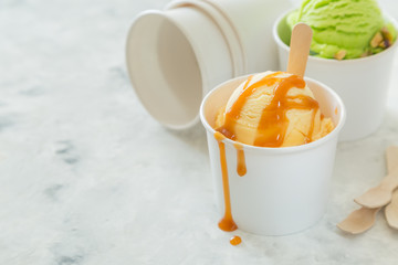 Caramel ice cream in paper cone