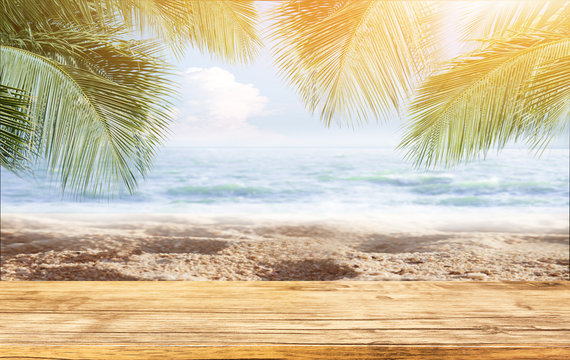 Hello summer table on Tropical Sand beach with sea and coconut palm leaves in relaxation time. Happiness and relax on the beach during summer concept.