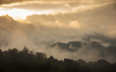Beautiful mountains with clouds and fogs.