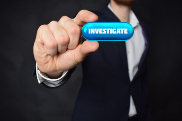 A businessman shows an inscription:INVESTIGATE