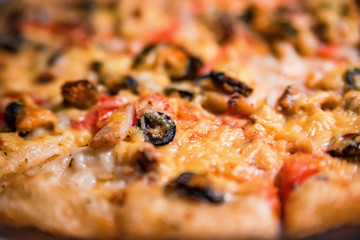 Close up hot sliced pizza