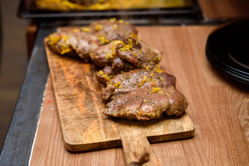 Roasted duck fillet on wooden board