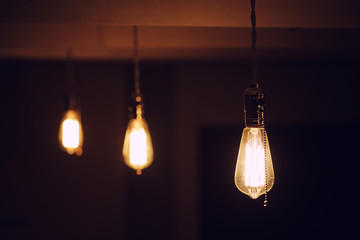 Lamps with tungsten filament. Edison's light bulb. Filament fila