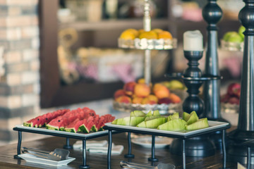 Fresh and bright continental breakfast table with jam. Table settings