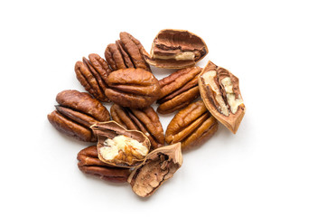 Isolated open pecan nuts. Top view.