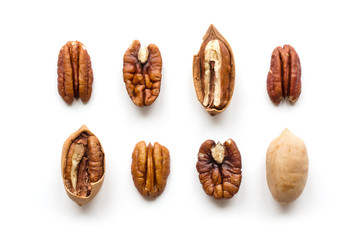Isolated pecan nuts set. Top view.  - obrazy, fototapety, plakaty