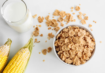 Healthy Corn Flakes with milk for Breakfast on table, food and drink