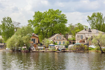 Fototapeta na wymiar Residential houses on the shore of the reservoir