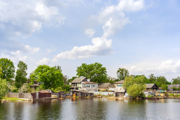 Fototapeta na wymiar Ostashkov houses on the shore of Lake Seliger