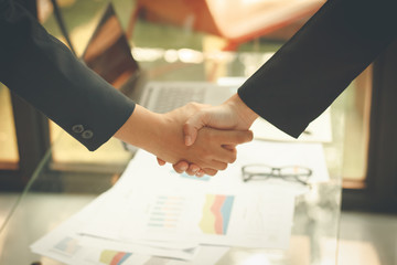 Businessmen agree to partner in the trade,Accountant working at office,Manager present the work to customers,Boss training,Export conference report,Employees worried about export decline.