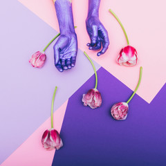 pearly purple hands and tulips. ultra violet. pastel minimal. beautiful concept