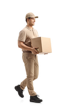 Delivery Guy Carrying A Package And Walking