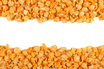 Delicious popcorn lying on the white background