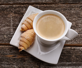cup of coffee on  wooden background
