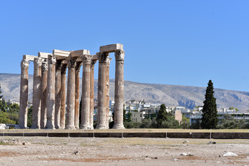 Ancient columns of old ruins on landscape, Temple of Zeus, Athens, Greece