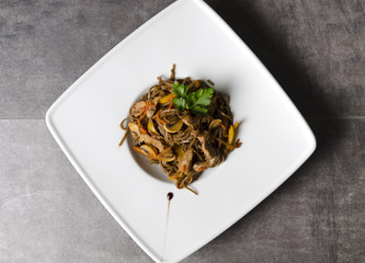 Noodles with pork and mushrooms