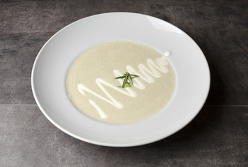 Cream of mushroom soup on a white plate
