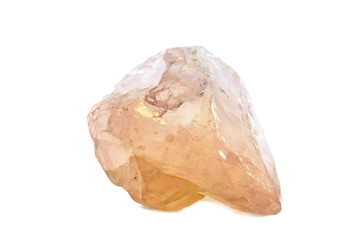 Macro shooting of natural gemstone. Raw mineral rose quartz. Isolated object on a white background.