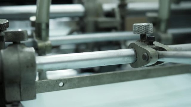 Documents Printing on Vintage Old Conveyor Machine in Retro Style Typography. 4K.