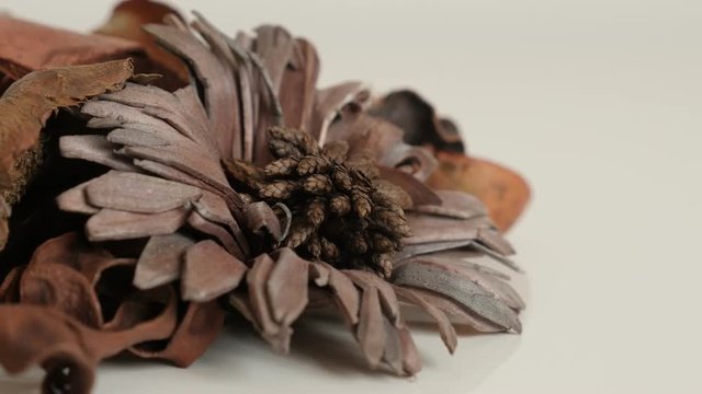 Dried petals mixture with spices slow tilt  footage - Potpourri fragrant flowers close-up 