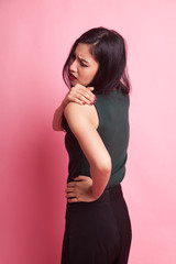 Fototapeta premium Young Asian woman got back pain.