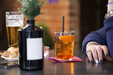 waiting with a cocktail