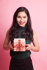 Young Asian woman with a gift box.