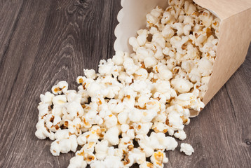 delicious popcorn on the wooden table