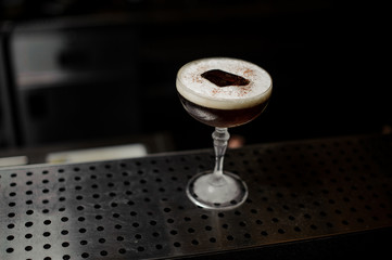 Delicious liquor cocktail standing on the bar stand