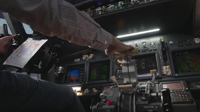 Aircraft pilots hand movies the control lever