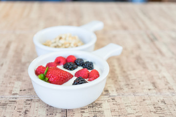 Yogurt , strawberries, Raspberries and Granola Healthy Organic Breakfast