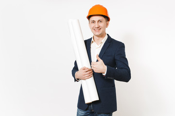 Smiling businessman in dark suit, protective construction helmet holding blueprints plans and showing thumb up isolated on white background. Male worker for advertisement. Business, working concept.