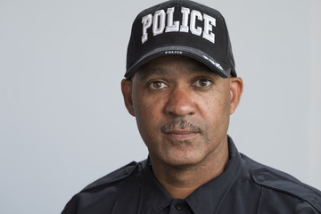 Portrait of a police officer, close up head and shoulders