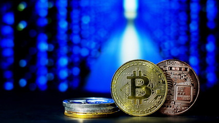 The digital currency coins with blue light bokeh background