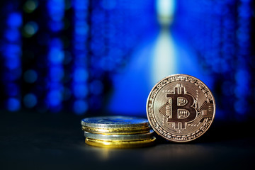 The digital currency coins with blue light bokeh background