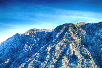 Panorama of a beautiful natural landscape. Mountains against the blue sky