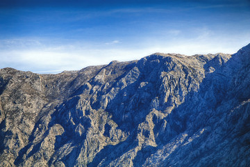 Panorama of a beautiful natural landscape. Mountains against the blue sky